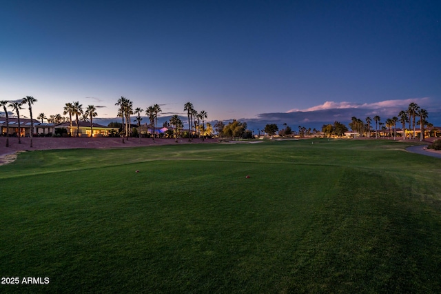 surrounding community featuring a lawn