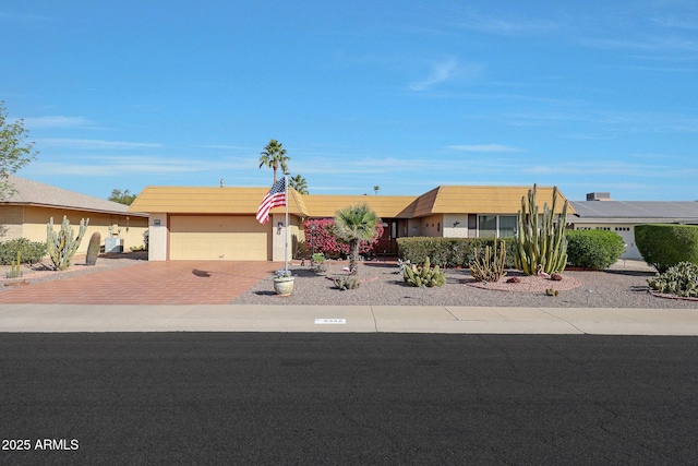 single story home with a garage