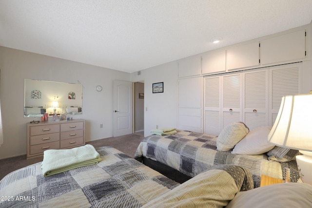 bedroom with carpet flooring and a closet