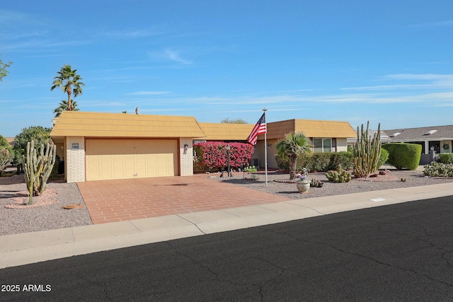 ranch-style home with a garage