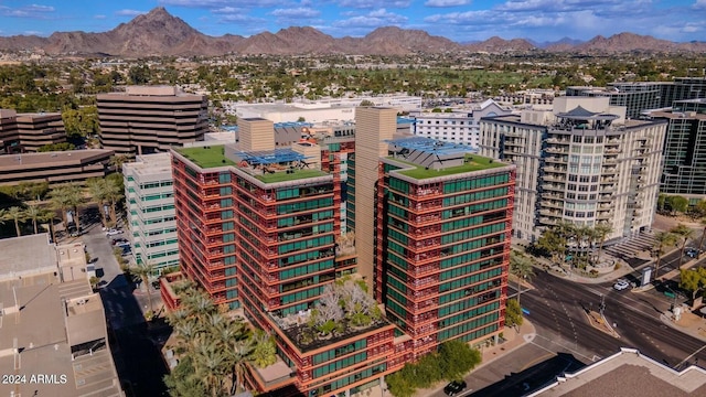 birds eye view of property featuring a mountain view