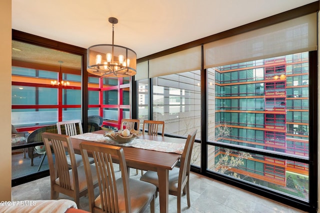 dining space with a chandelier