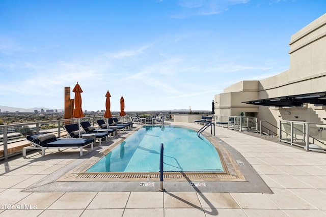 pool featuring a patio area