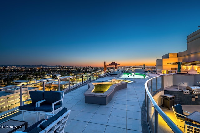 view of patio / terrace with a balcony