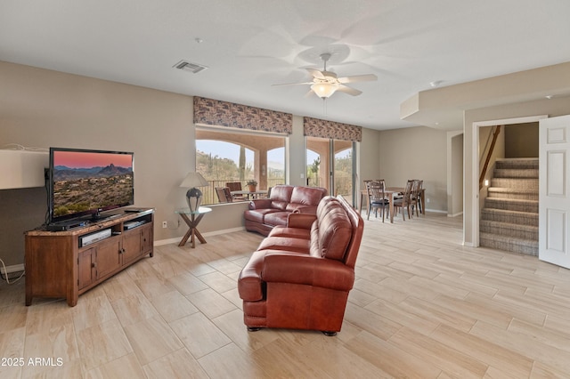 living room with ceiling fan