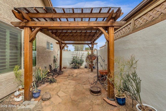 view of patio featuring a pergola