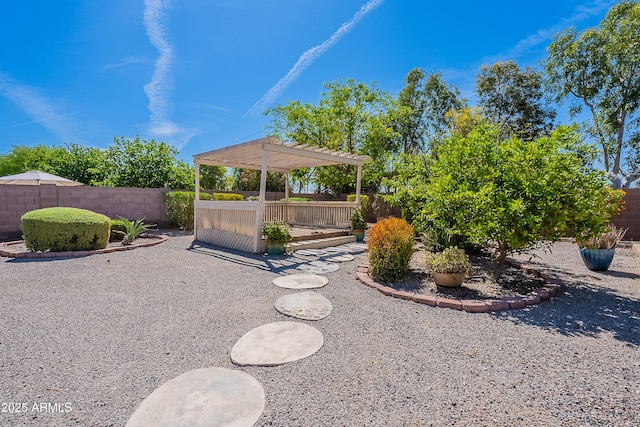 view of yard with a pergola, a patio, and a fenced backyard