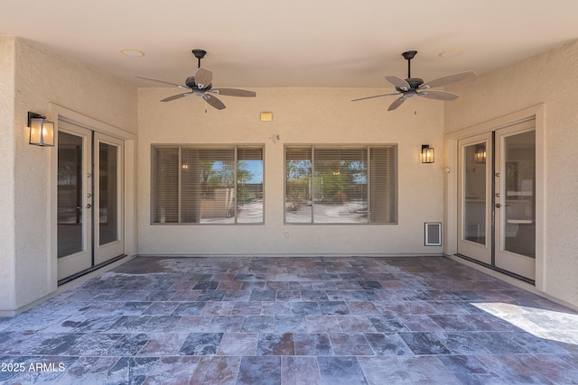 view of patio featuring a ceiling fan and french doors