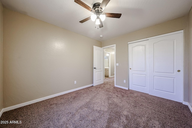 125 N 22nd Pl Unit 14, Mesa, AZ 85213 - unfurnished bedroom featuring baseboards, carpet flooring, a closet, and ceiling fan