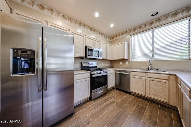 125 N 22nd Pl Unit 14, Mesa, AZ 85213 - kitchen featuring stainless steel appliances, a sink, dark wood-style floors, light countertops, and recessed lighting