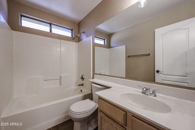 125 N 22nd Pl Unit 14, Mesa, AZ 85213 - bathroom with toilet, washtub / shower combination, vanity, and wood finished floors