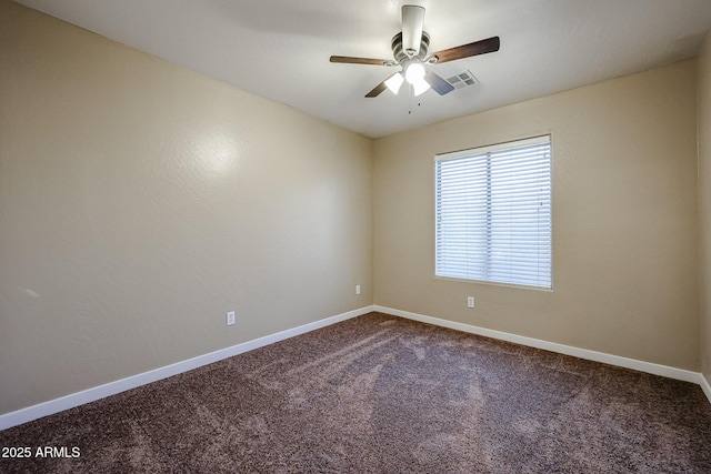 125 N 22nd Pl Unit 14, Mesa, AZ 85213 - empty room with a ceiling fan, dark colored carpet, and baseboards