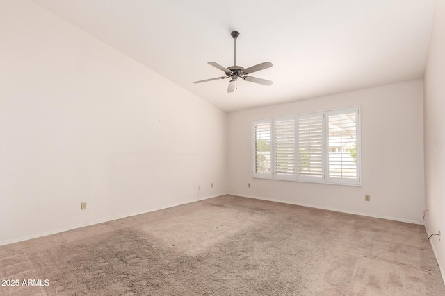 24907 S Lakestar Dr, Sun Lakes, AZ 85248 - empty room with carpet floors, vaulted ceiling, ceiling fan, and baseboards