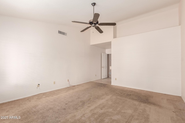 24907 S Lakestar Dr, Sun Lakes, AZ 85248 - spare room with light carpet, a ceiling fan, and a towering ceiling