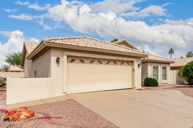 24907 S Lakestar Dr, Sun Lakes, AZ 85248 - view of front of property featuring stucco siding, an attached garage, driveway, and a tiled roof