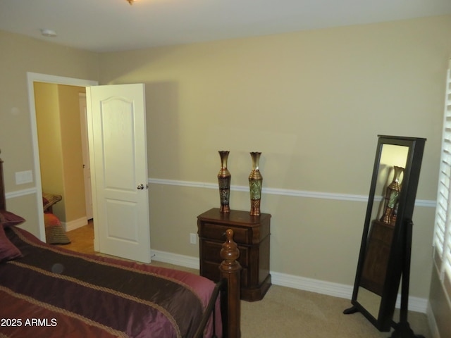 bedroom with light colored carpet