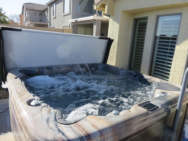 exterior details with a jacuzzi