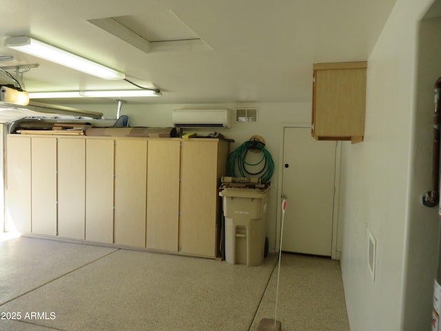 garage featuring a garage door opener and an AC wall unit