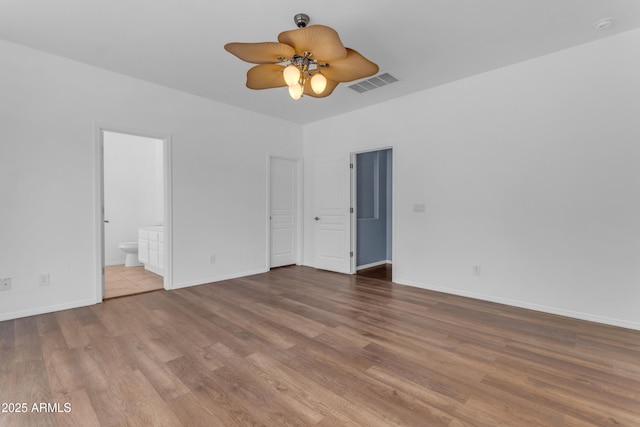 11630 W Jefferson St, Avondale, AZ 85323 - empty room featuring wood finished floors and ceiling fan