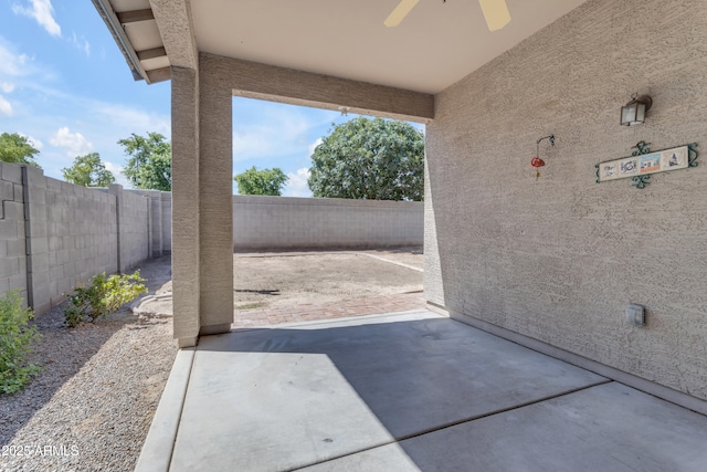 11630 W Jefferson St, Avondale, AZ 85323 - fenced backyard featuring a patio and a ceiling fan