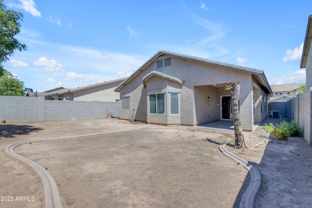 11630 W Jefferson St, Avondale, AZ 85323 - rear view of house with a patio area, ceiling fan, a fenced backyard, and stucco siding