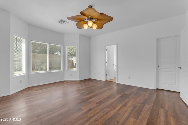 11630 W Jefferson St, Avondale, AZ 85323 - empty room with dark wood-type flooring and a ceiling fan