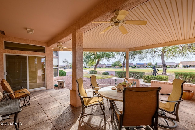 view of patio with ceiling fan