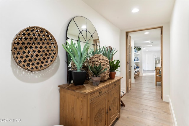 hallway featuring light wood-type flooring