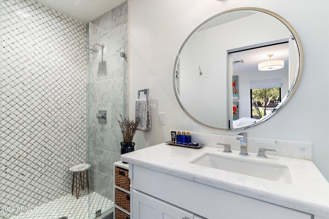 bathroom with vanity and an enclosed shower