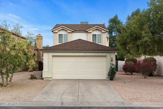 front of property featuring a garage