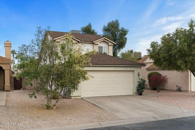 view of front of property featuring a garage