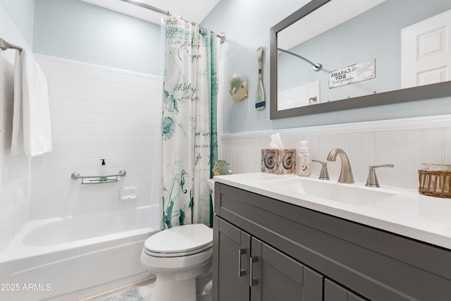 full bathroom with vanity, shower / bathtub combination with curtain, and toilet