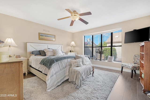 bedroom featuring hardwood / wood-style flooring and ceiling fan