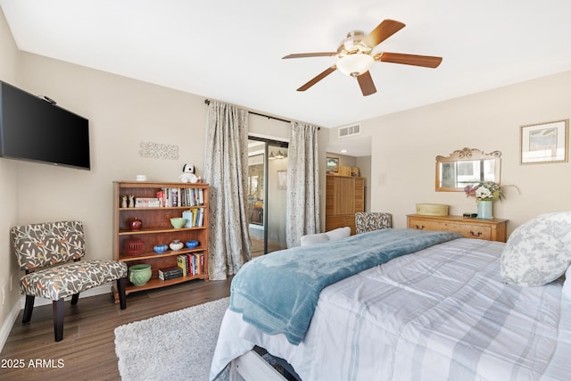 bedroom featuring hardwood / wood-style flooring and ceiling fan