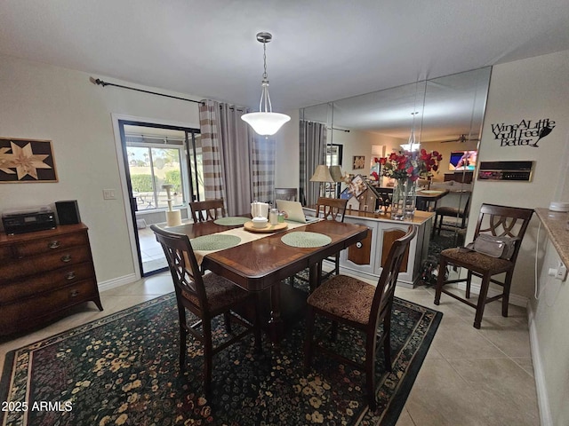 dining room featuring light tile patterned flooring