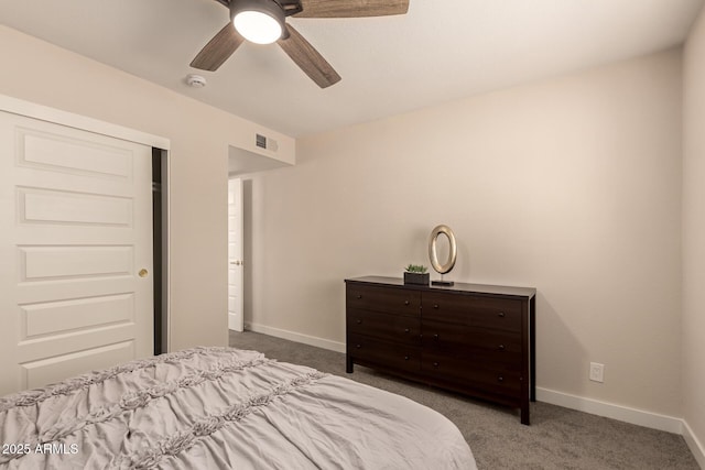 bedroom featuring baseboards, visible vents, and carpet floors