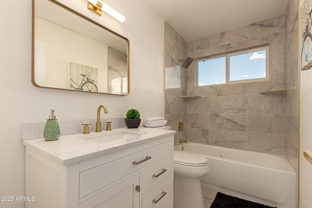 full bathroom featuring toilet, vanity, and shower / bathtub combination