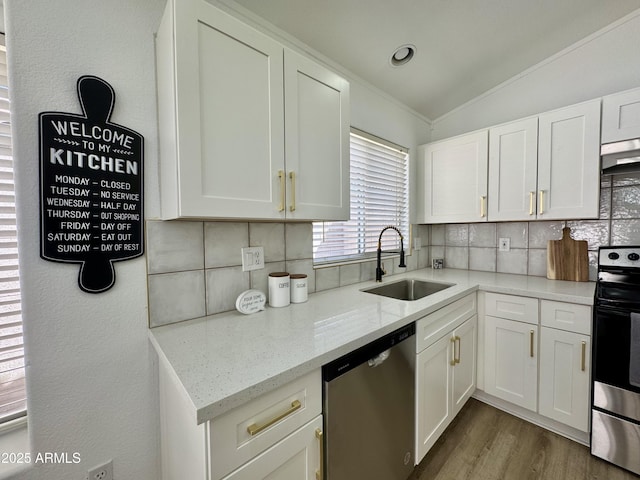 5984 W Geronimo Ct, Chandler, AZ 85226 - kitchen with vaulted ceiling, backsplash, a sink, and stainless steel appliances