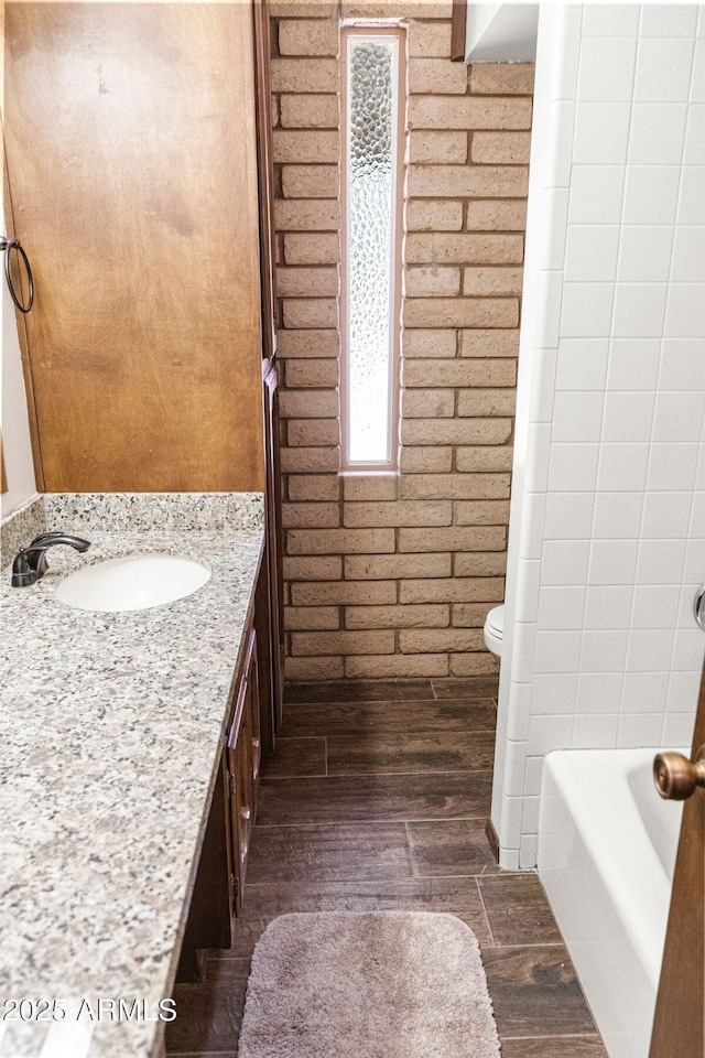 2452 Daisy Trl, Forest Lakes, AZ 85931 - bathroom featuring wood finished floors, vanity, and toilet