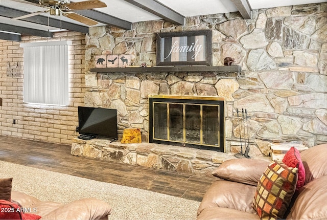 2452 Daisy Trl, Forest Lakes, AZ 85931 - living area featuring hardwood / wood-style floors, beamed ceiling, a ceiling fan, and a fireplace