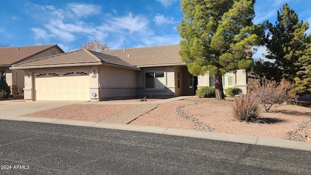 ranch-style house with a garage