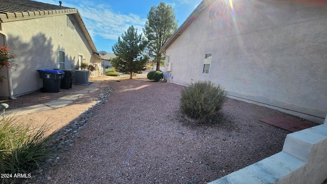 view of yard featuring central AC