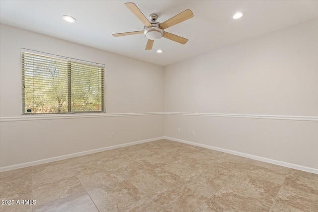 empty room with baseboards, ceiling fan, and recessed lighting