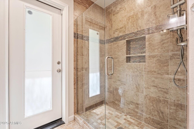 bathroom featuring a stall shower