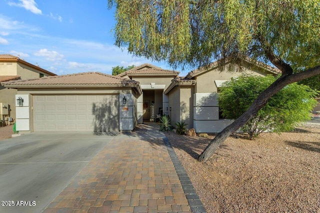 32881 N Hidden Canyon Dr, San Tan Valley, AZ 85144 - ranch-style home with stucco siding, an attached garage, concrete driveway, and a tile roof