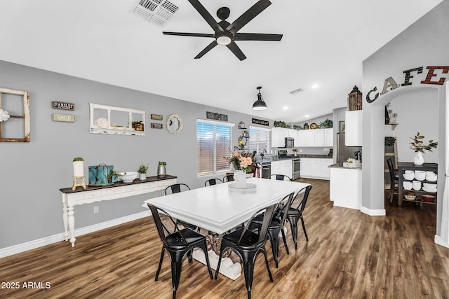 32881 N Hidden Canyon Dr, San Tan Valley, AZ 85144 - dining area with lofted ceiling, wood finished floors, visible vents, and a ceiling fan