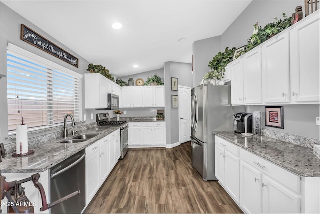 32881 N Hidden Canyon Dr, San Tan Valley, AZ 85144 - kitchen featuring a sink, dark wood-style flooring, white cabinetry, lofted ceiling, and appliances with stainless steel finishes
