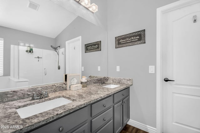 32881 N Hidden Canyon Dr, San Tan Valley, AZ 85144 - full bath featuring wood finished floors, visible vents, a sink, and a shower