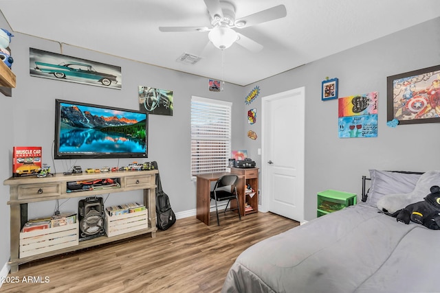 32881 N Hidden Canyon Dr, San Tan Valley, AZ 85144 - bedroom with ceiling fan, baseboards, wood finished floors, and visible vents