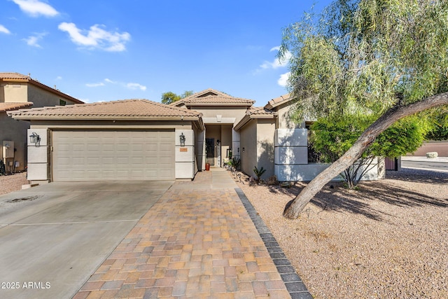 32881 N Hidden Canyon Dr, San Tan Valley, AZ 85144 - single story home with a tiled roof, concrete driveway, fence, an attached garage, and stucco siding